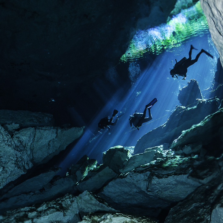 scuba diver in the Taj Ma Ha Ha Cenote and Cavern near playa del Carmen