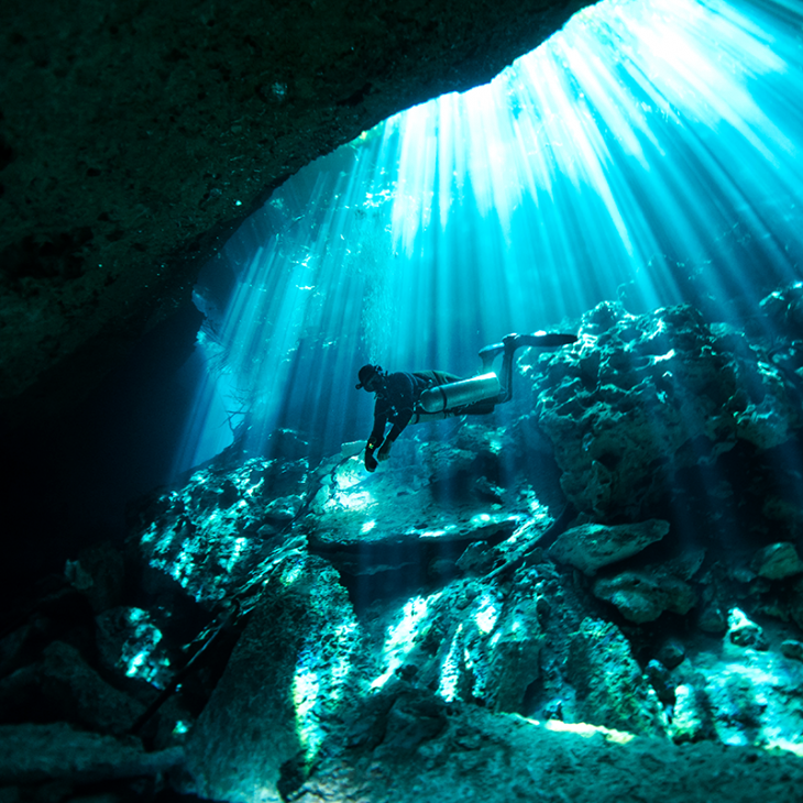 scuba diver in the Chikin Ha Cenote and Cavern near playa del Carmen